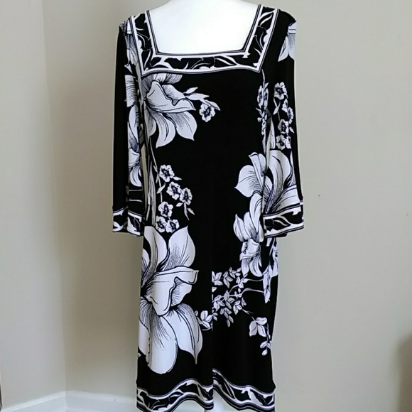 White House Black Market Dresses & Skirts - WHBM long sleeve floral dress.